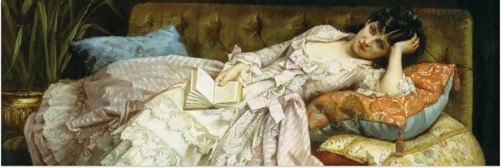 Девушка XIX века лежит на диване с книгой